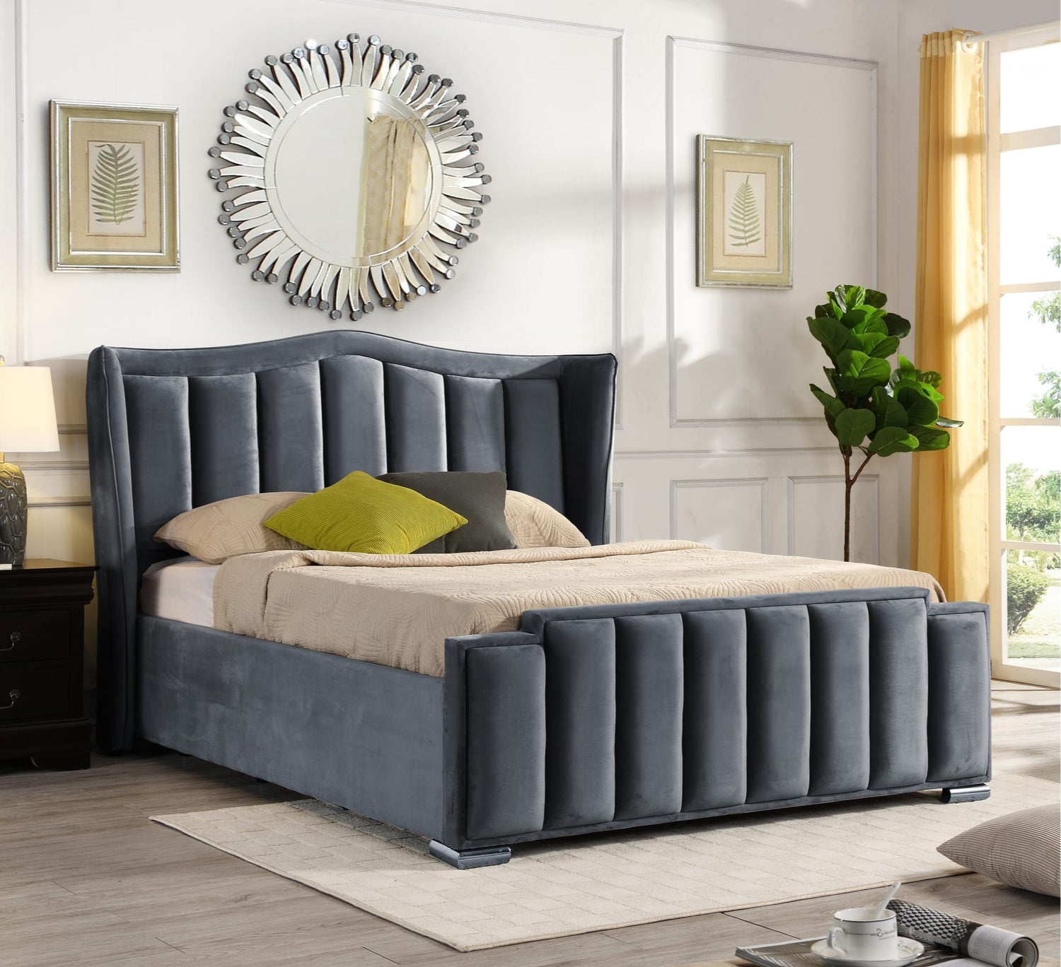 Grey upholstered bed in a stylish bedroom with decor elements.